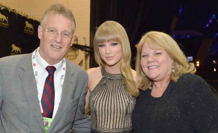 Taylor Swift parents has revealed that while the daughter [Taylor] was ‘trying to keep it together,’ it was obvious to that she has already ‘falling’ hard for her new beau. Travis Kelce